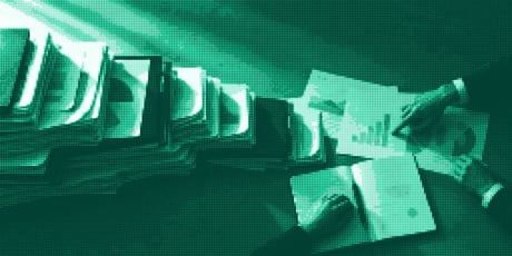 Marketing reports scattered over a desk